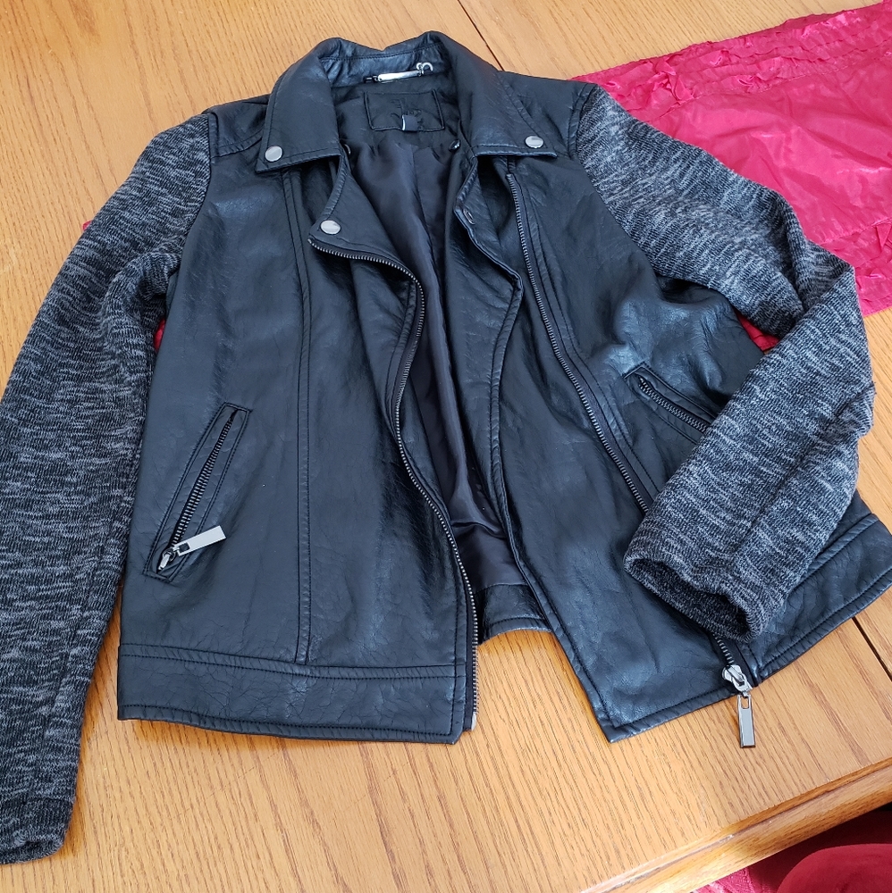 Juniors leather and sweater jacket.